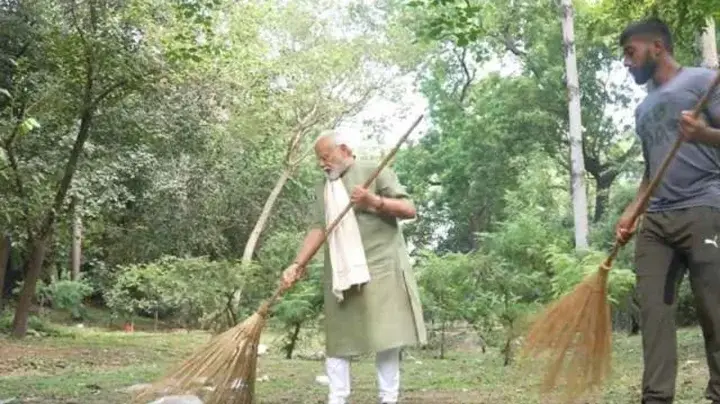 Modi is cleaning dirt with a broom My News Bangladesh